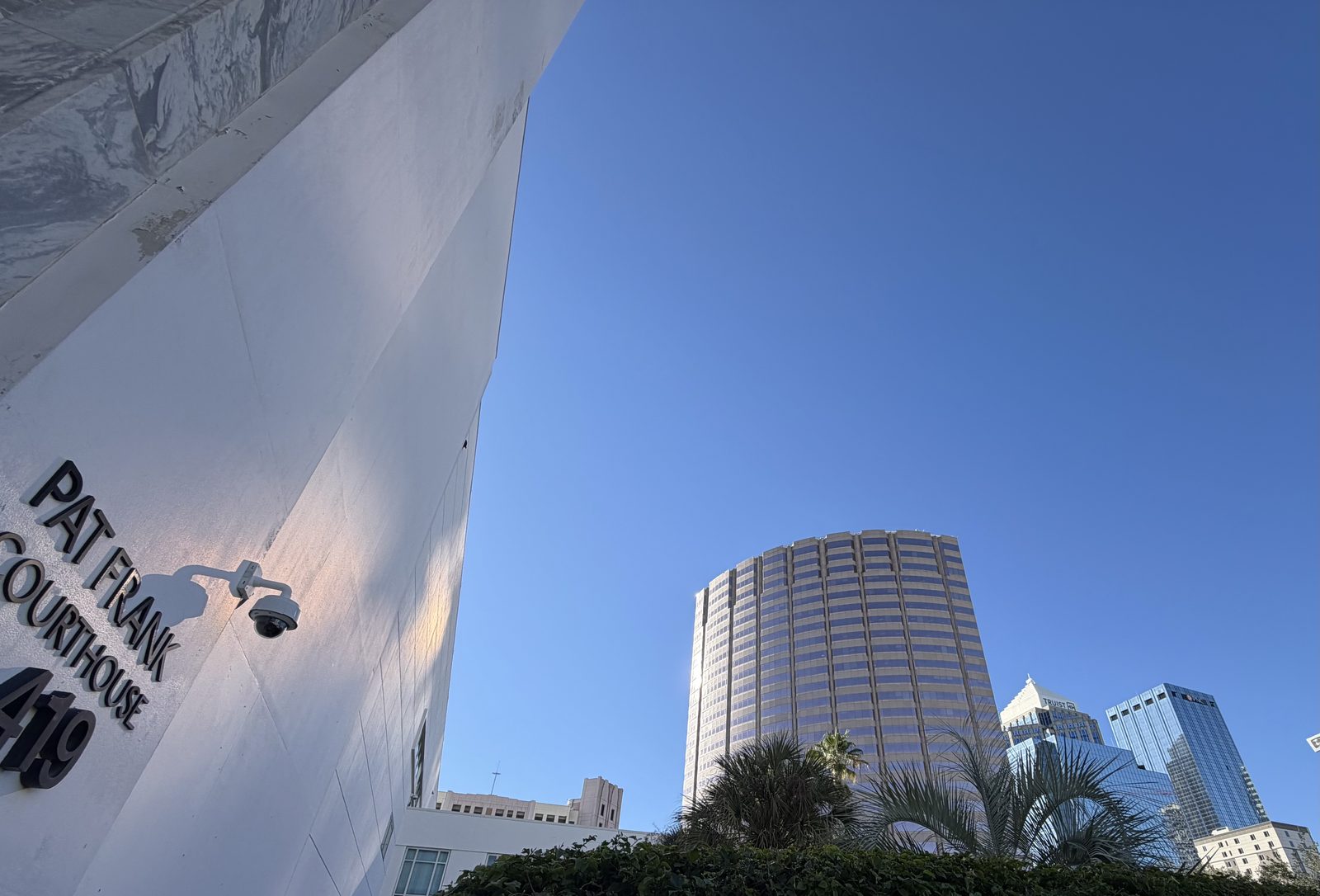 Pat Frank Courthouse sign with the downtown Tampa skyline